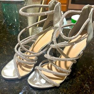 Strap high heels with lots of bling